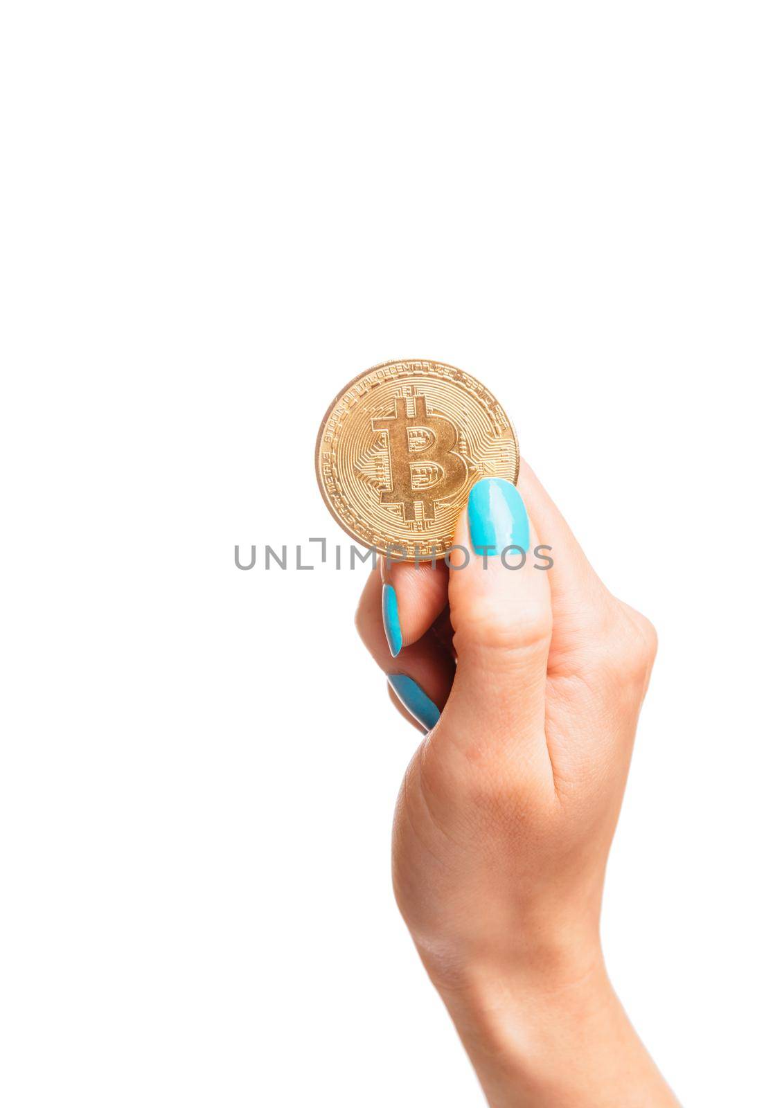 Hand with gold coin bitcoin isolated on a white background, symbol of crypto currency and virtual money.