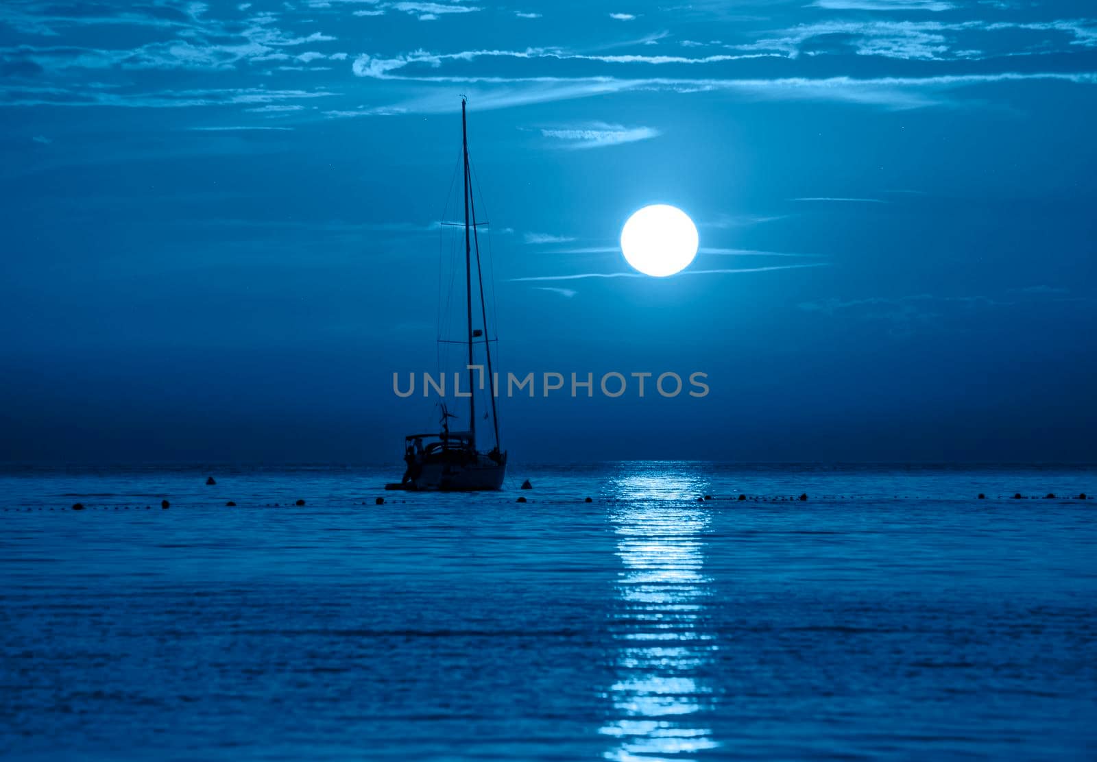 Beautiful night sea, yacht and full moon. Night classic blue seascape. Trendy Banner with color of the year 2020