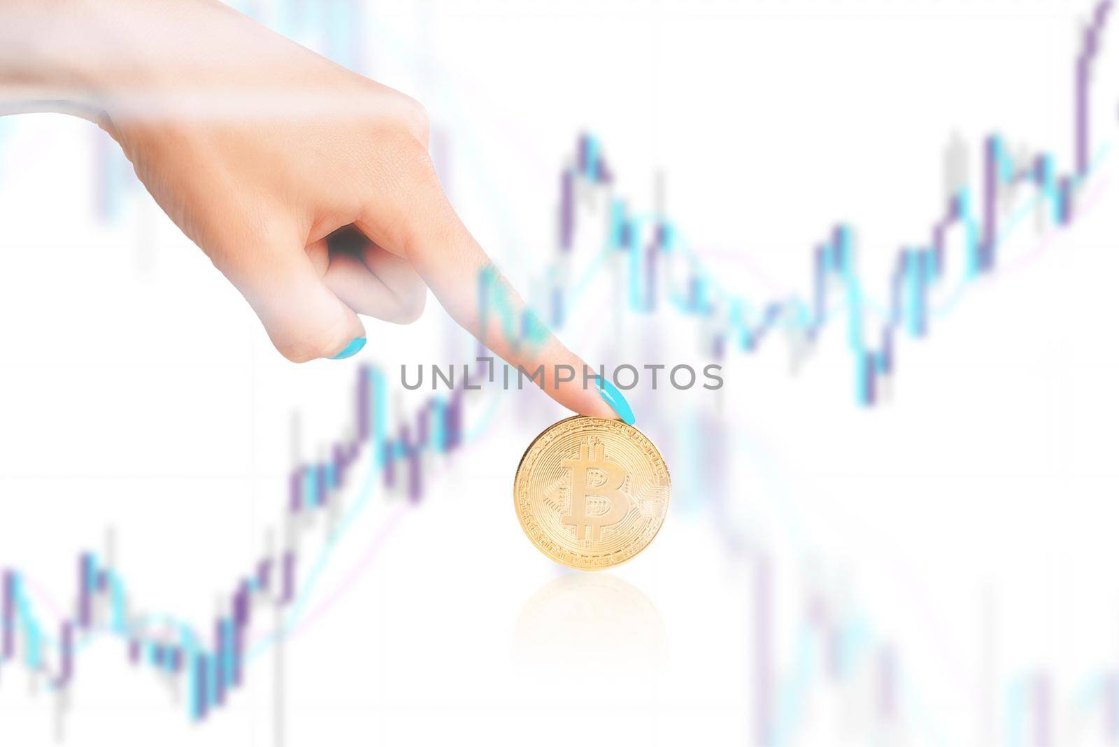 Multiexposure of hand pointing to bitcoin and chart. by alexAleksei