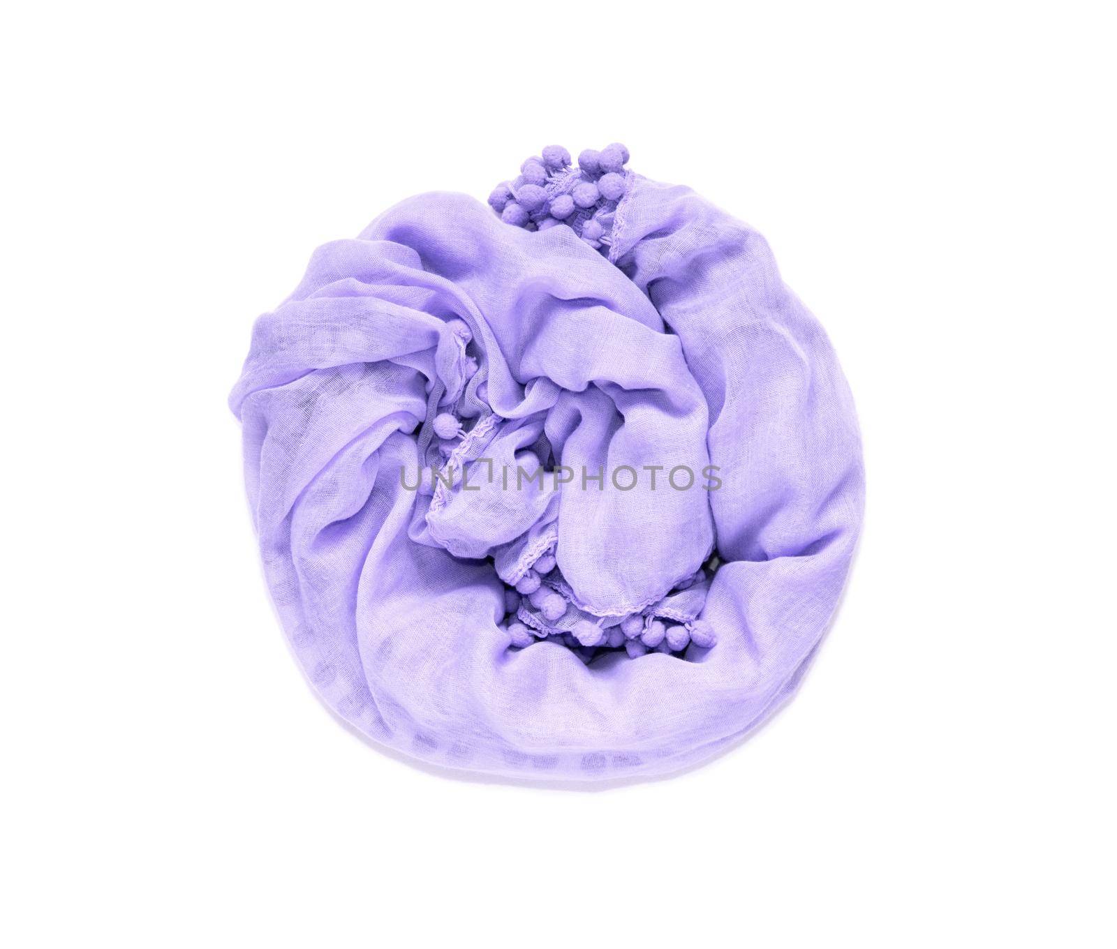 delicate, soft and crumpled twisted in a circle fabric of purple color is isolated on a white background by lunarts