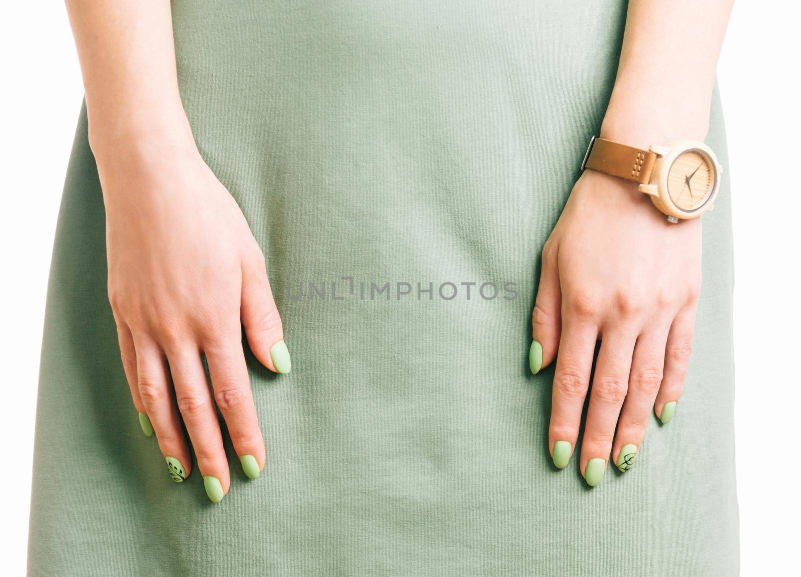 Female hands with green summer style manicure. by alexAleksei