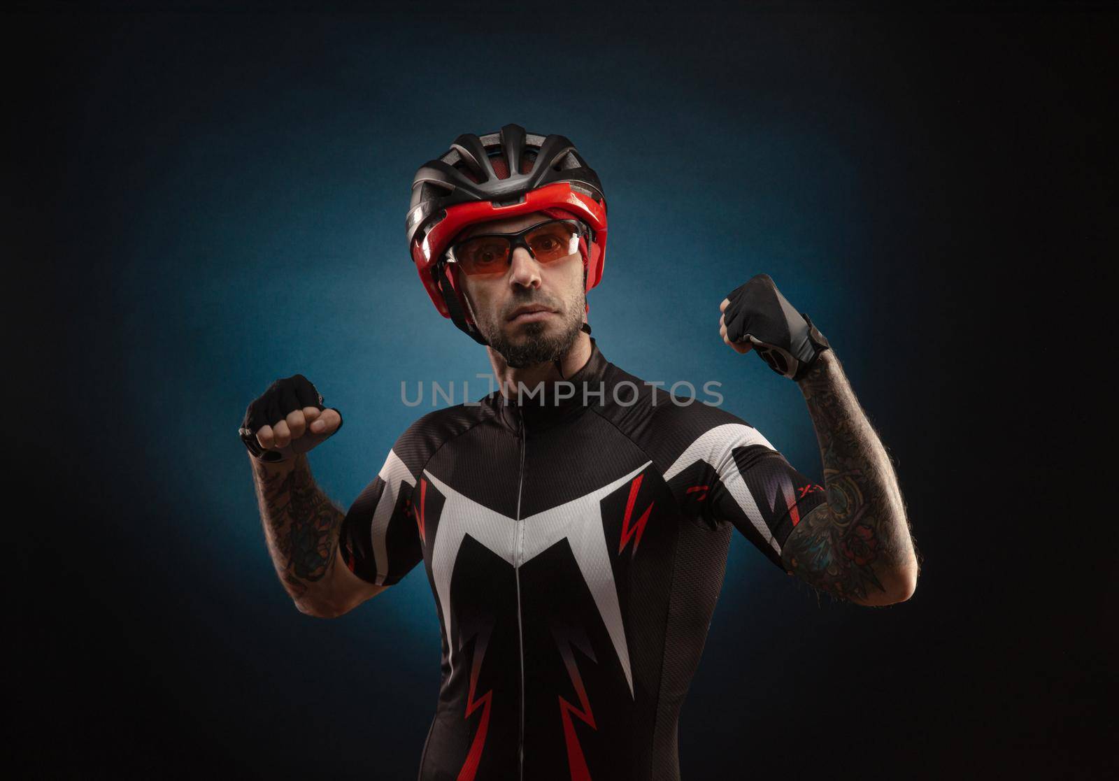 guy is a cyclist in a Bicycle helmet