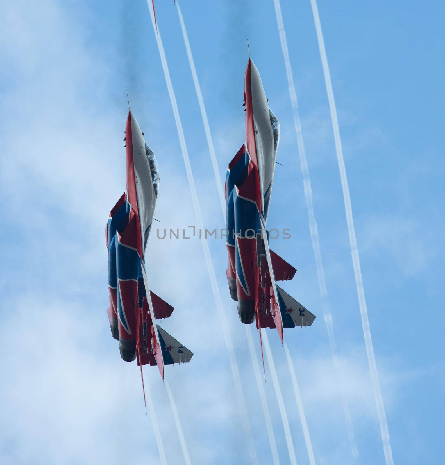 Kazan, Russian Federation - Oktober 27, 2018: Aerobatics performed by two planes of aviation group of Military-air forces of Russia Strizhi . Telephoto shot