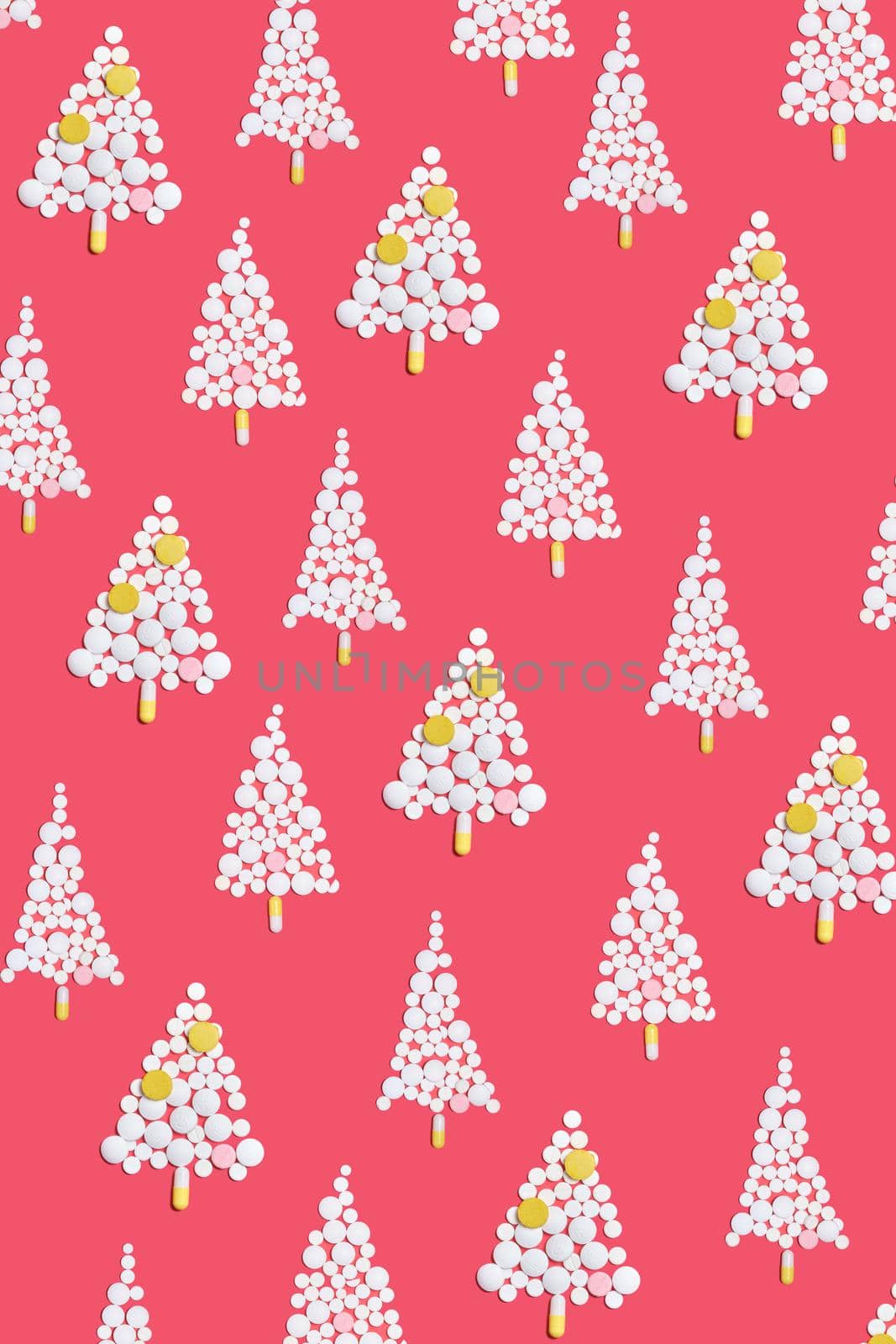 Christmas tree made of pills for Christmas, conceptual background on the New Year theme for medicine and pharmacy pattern