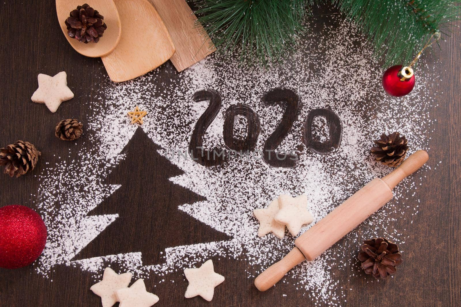 tree, new year 2020, numbers on flour, dark brown background, christmas background, new year, christmas, preparing cookies for the holiday, copy place, top view, cones, christmas toys, pine branch by natashko