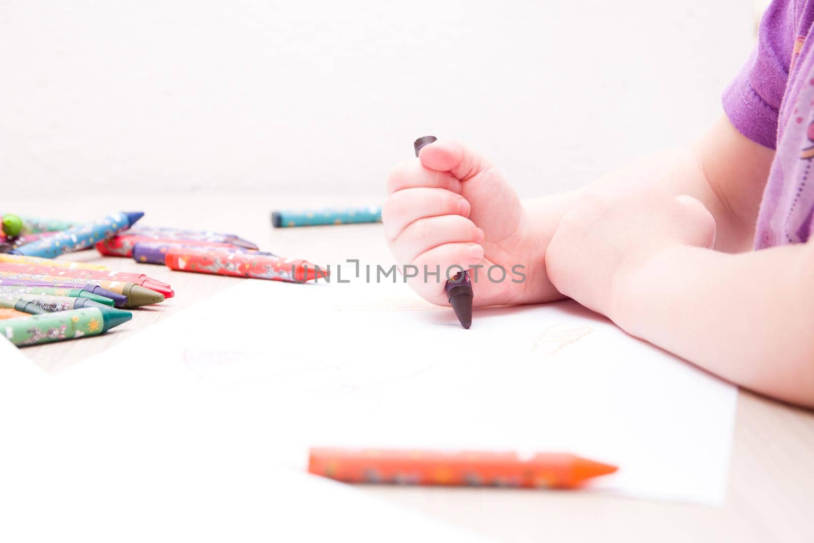 child draws a house on a white background by natashko