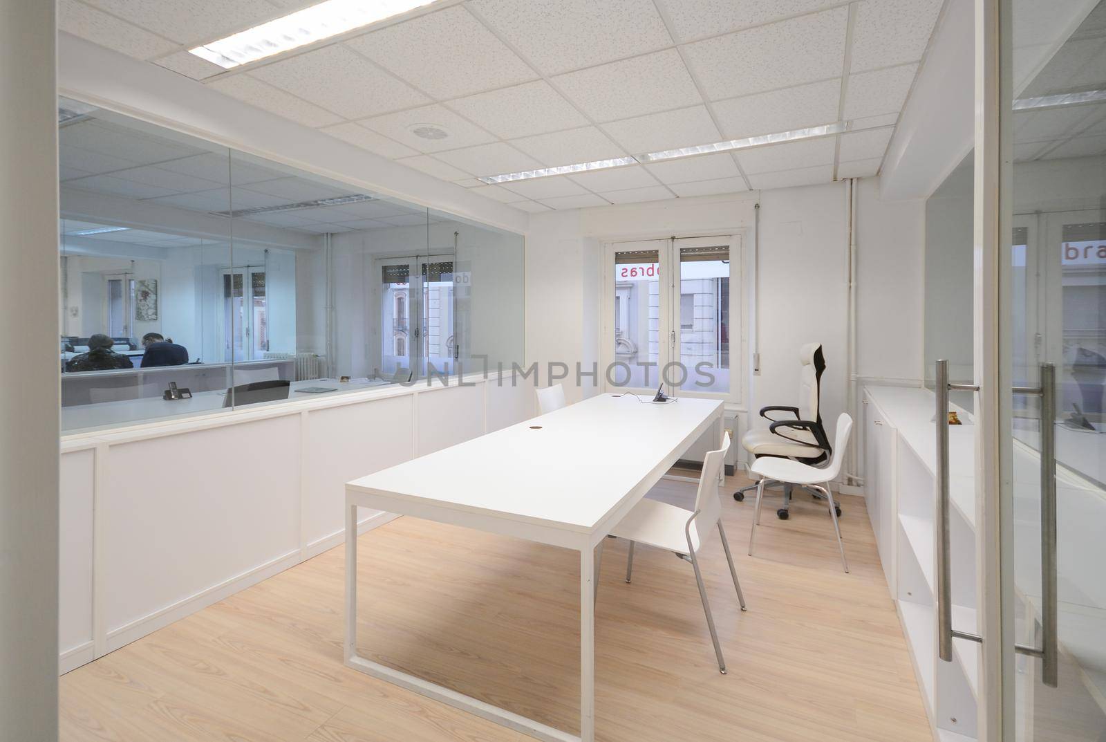 Empty modern office with white furniture