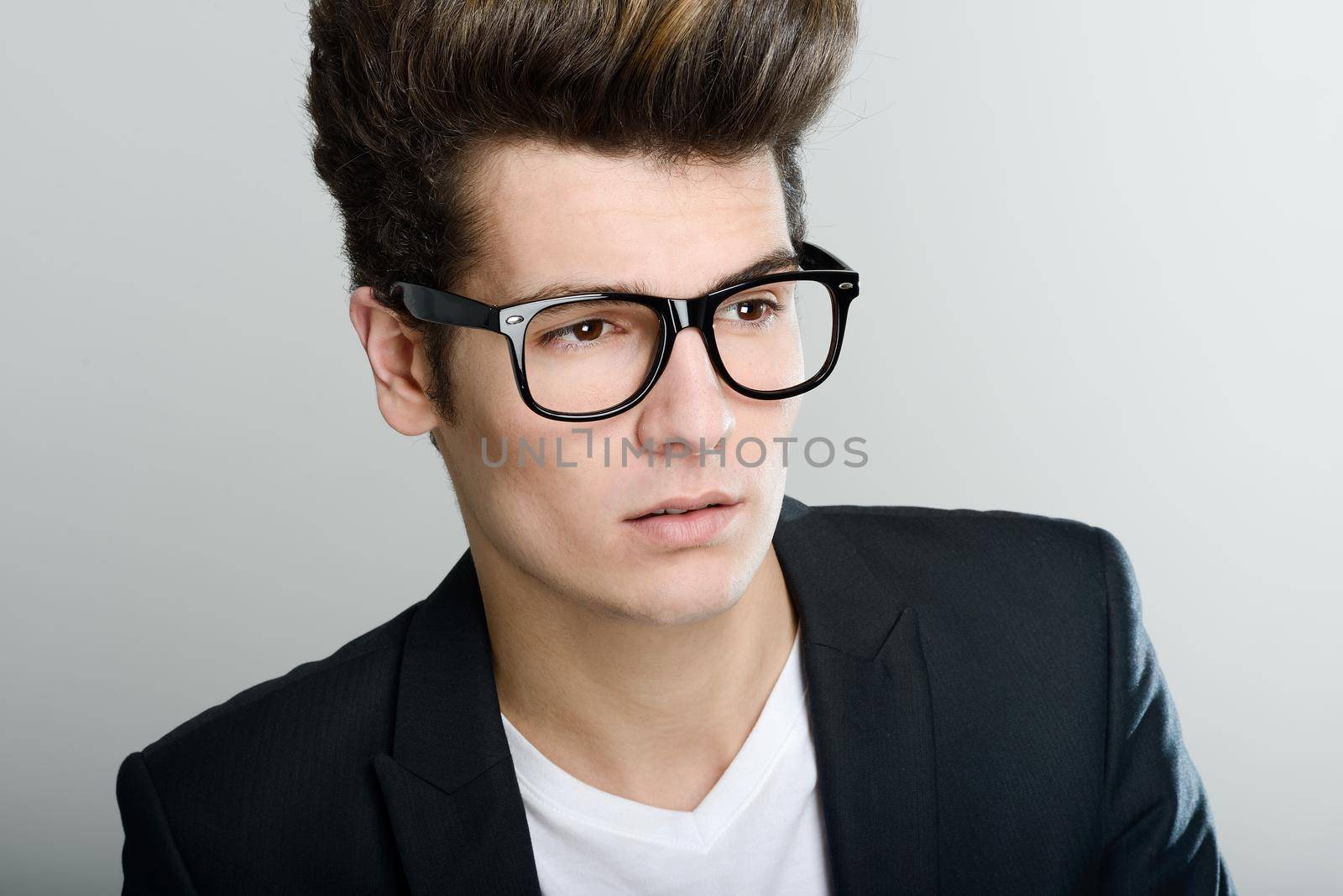 Young man with eyeglasses by javiindy