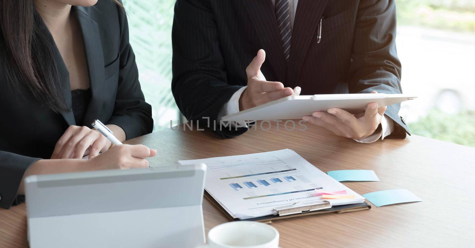 Finance manager meeting discussing company growth project success financial statistics, professional investor working start up project for strategy plan with document, laptop and digital tablet. by wichayada