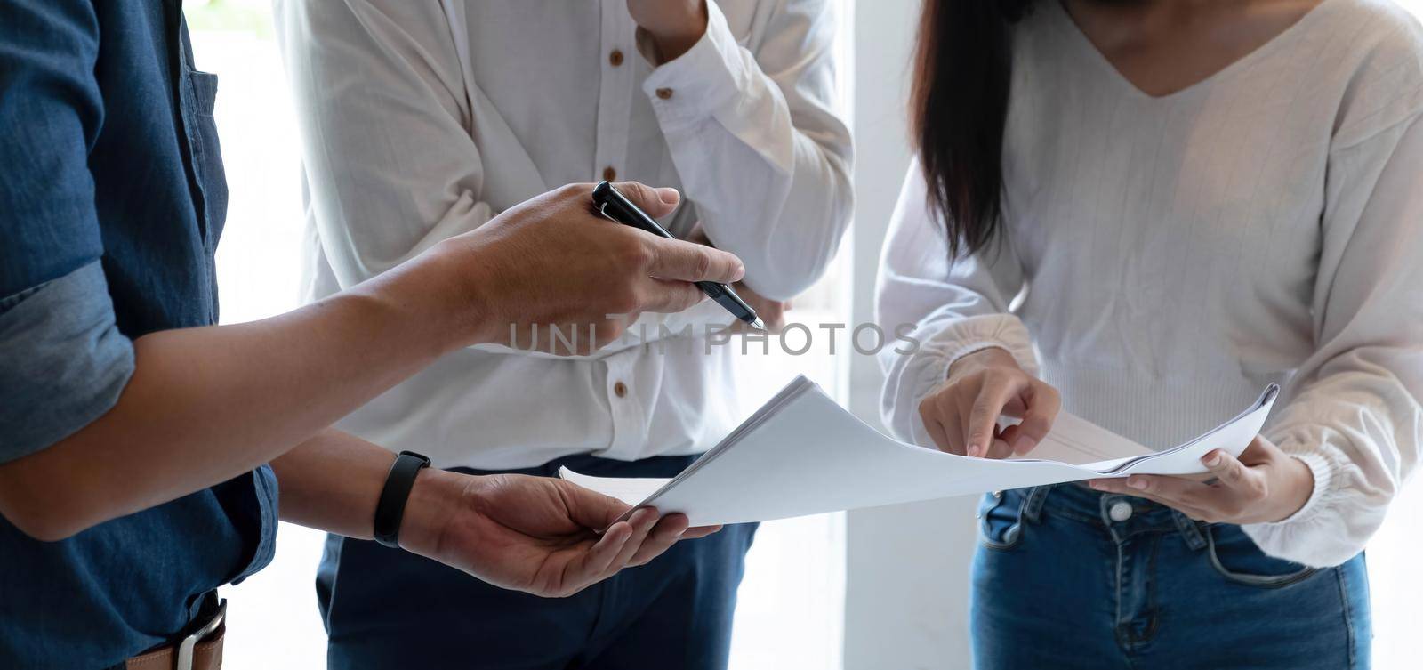 Business Corporate team brainstorming with chart and checking and analysis.