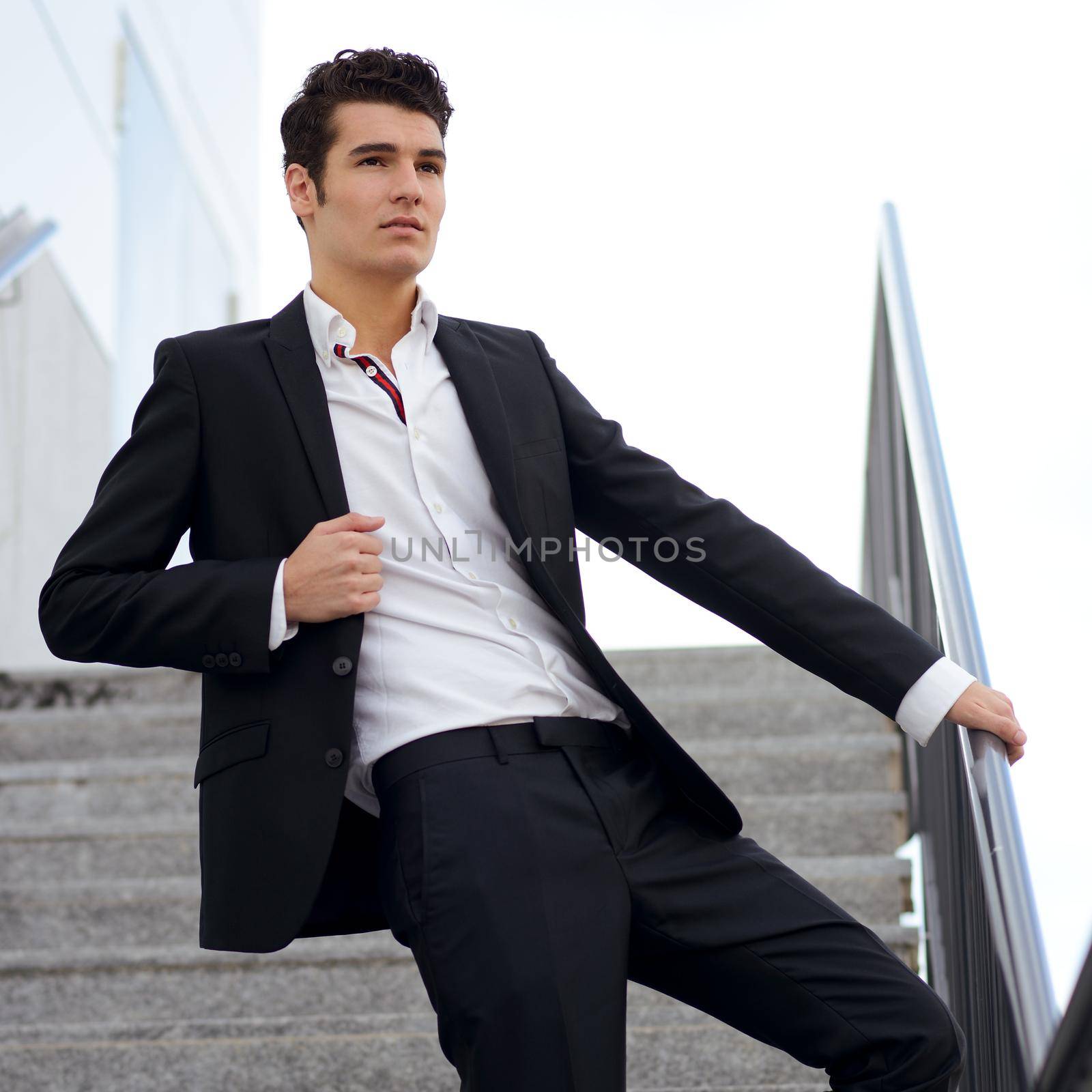 Young businessman, in an office building by javiindy