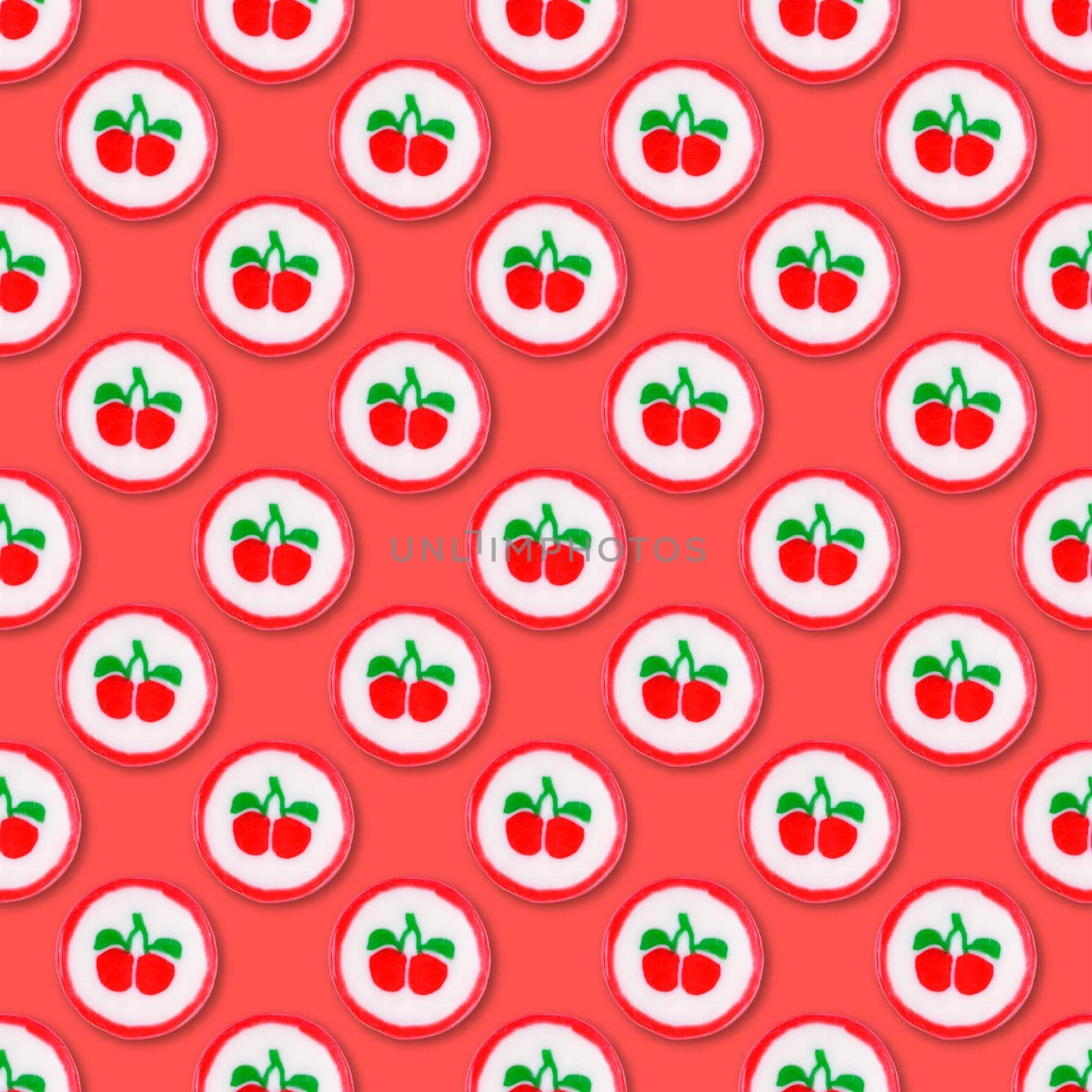 Lollipop candy seamless pattern on living coral background. Food background. Top view. Colorful candy seamless pattern