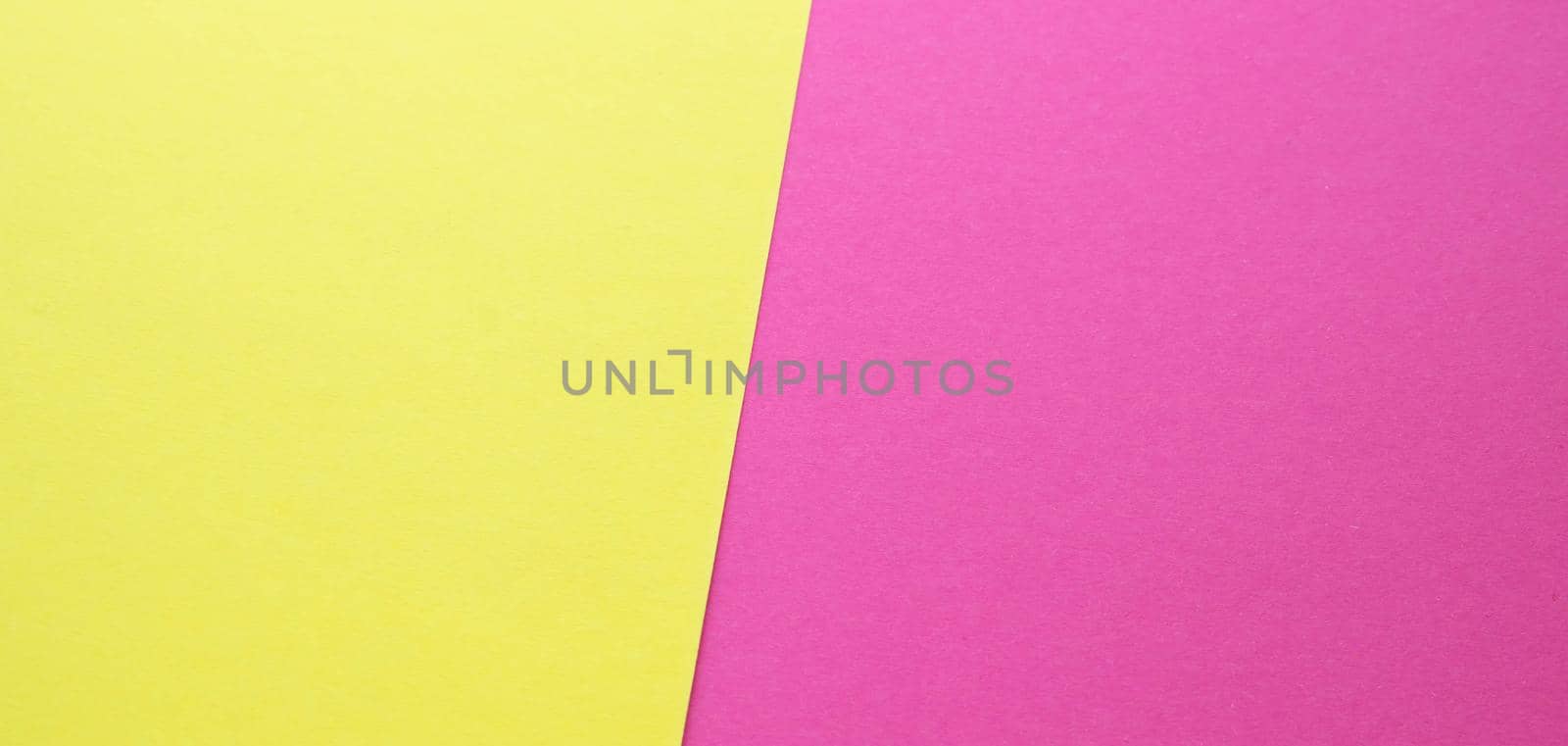 yellow and pink paper texture background Color. Trending colors, geometric background of the paper. Colorful soft paper background.Pastel color.