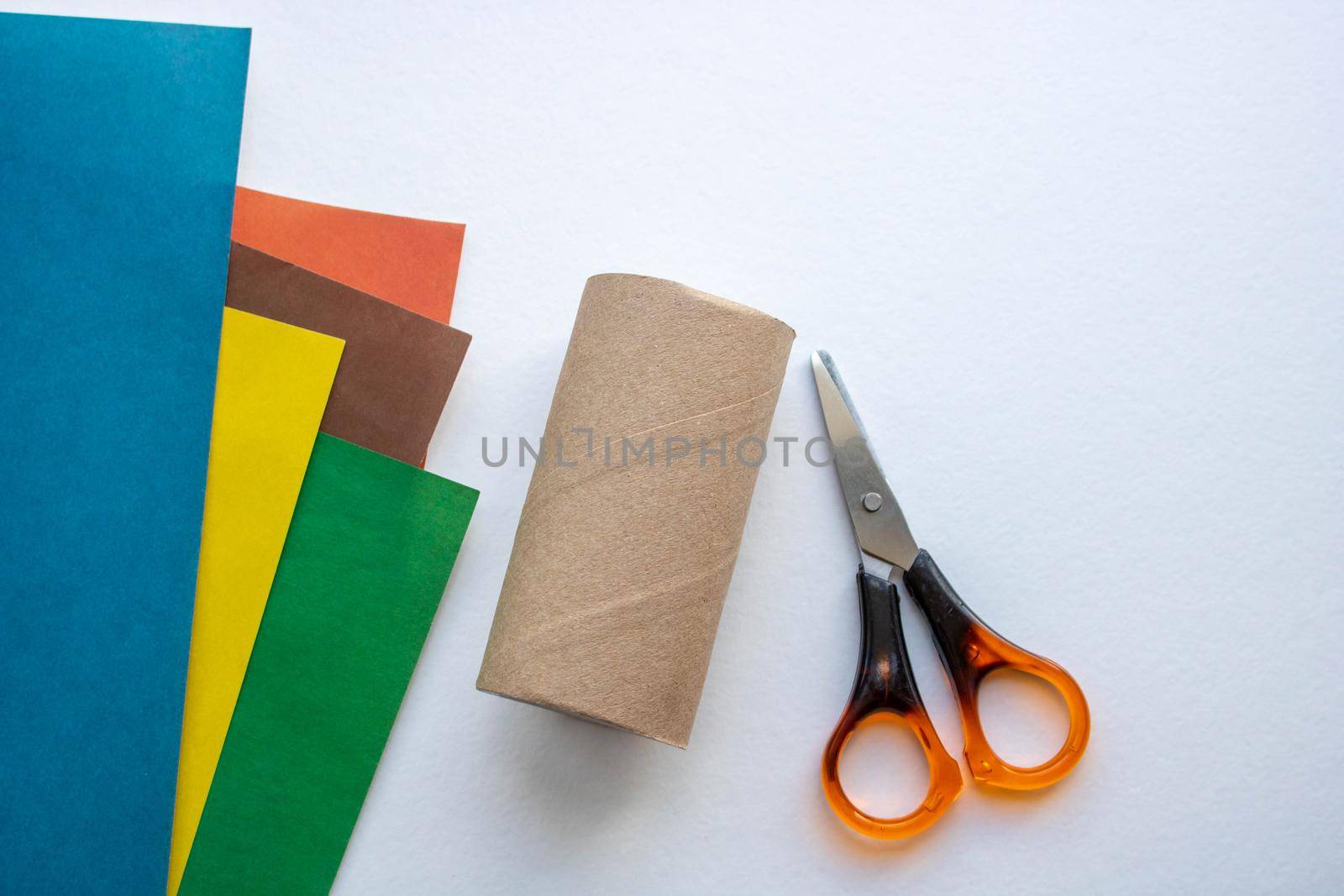 Step-by-step instructions. Step 1 Create a paper craft from a toilet sleeve. Brown bull. 2021.Chinese new year of the White Bull. Funny Halloween cute monster diy colored paper scissors glue. Children's educational education is an idea for creativity.