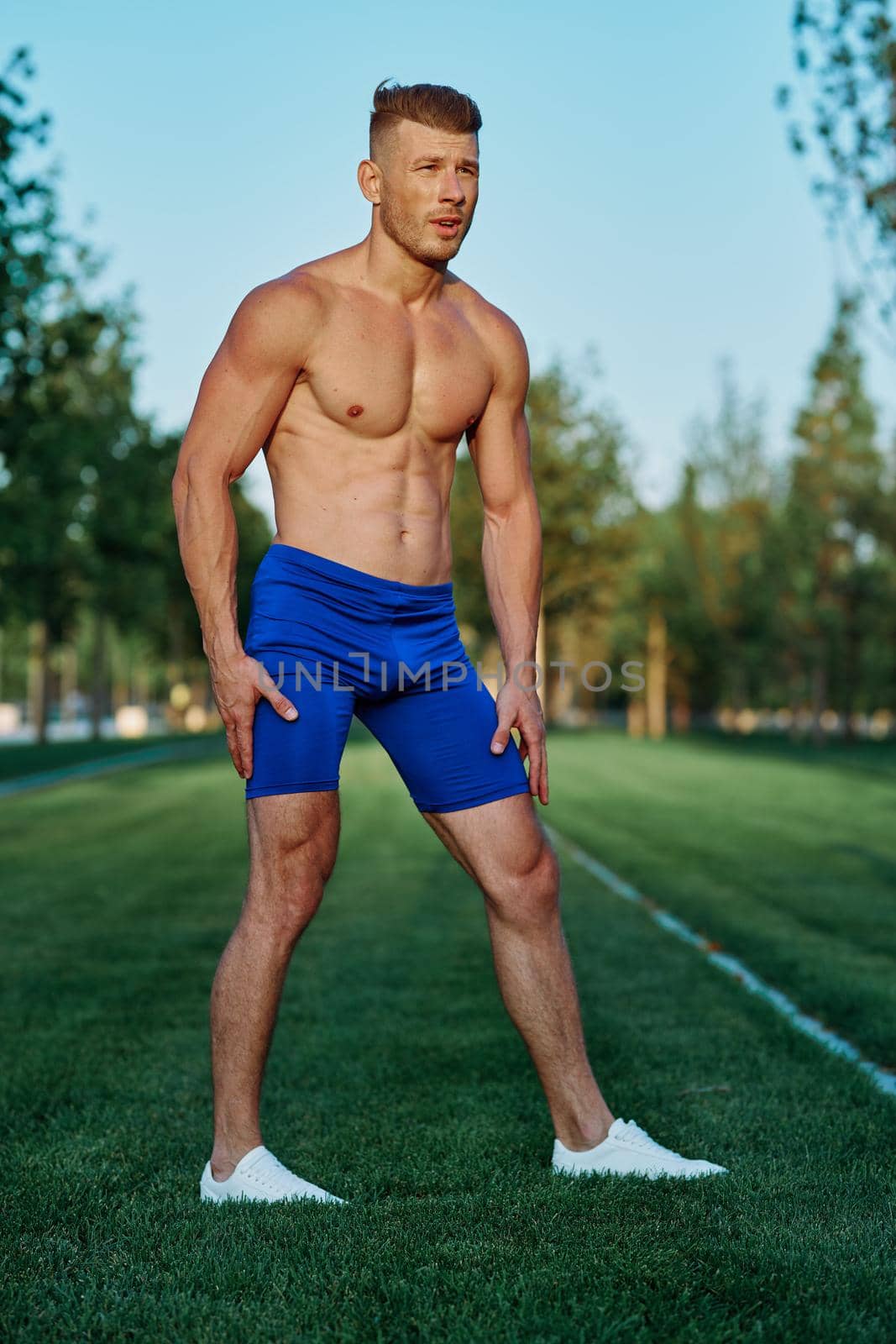 man in the park workout outdoor exercise. High quality photo