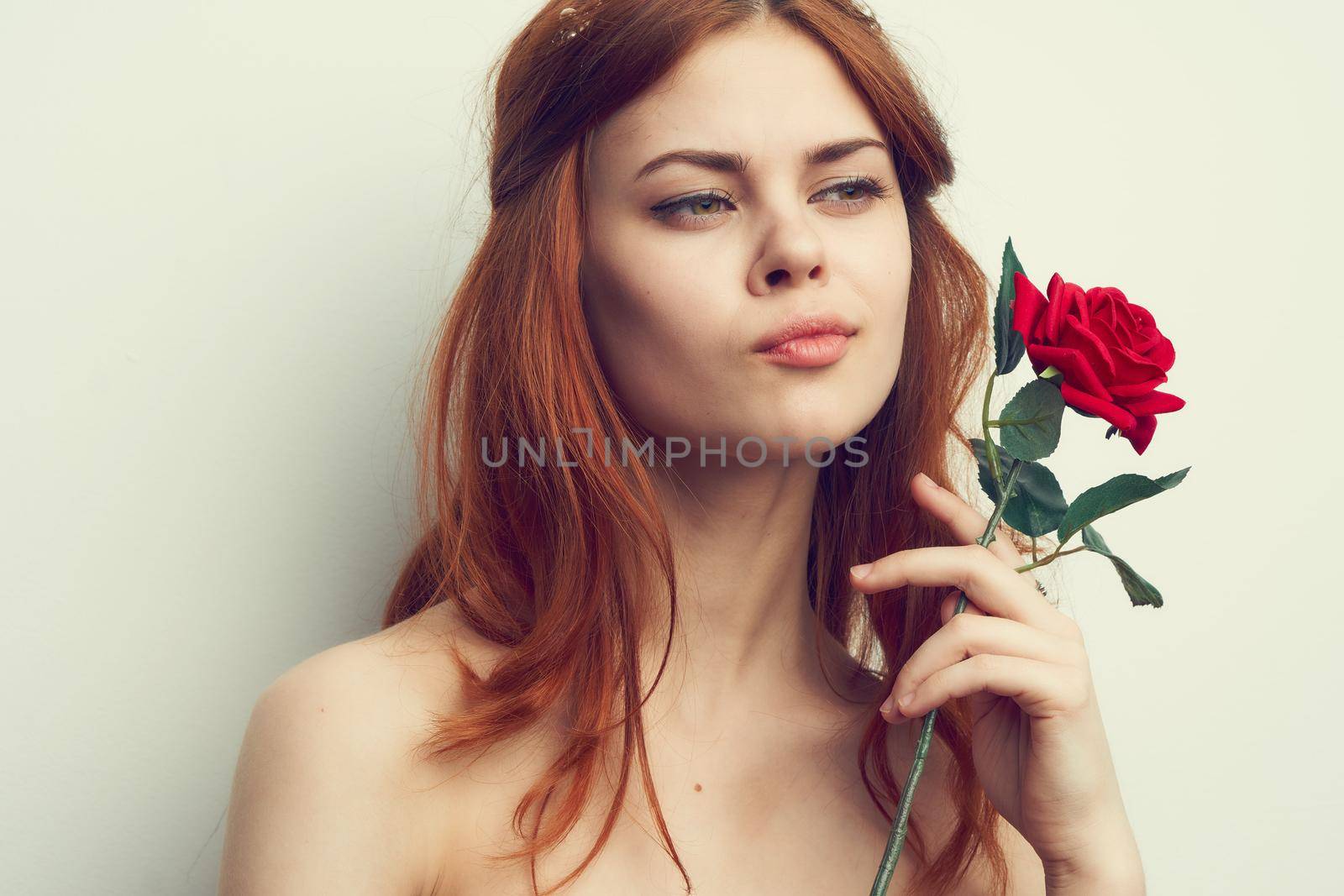 attractive woman with rose flower makeup romance model. High quality photo