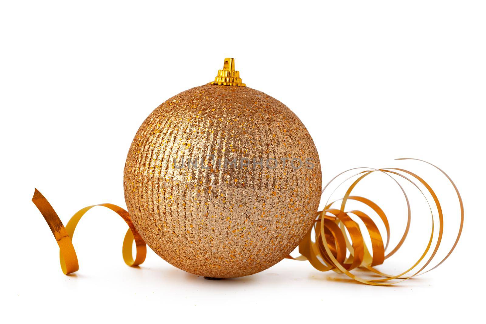 Gold sparkling Christmas bauble isolated on white background, close up