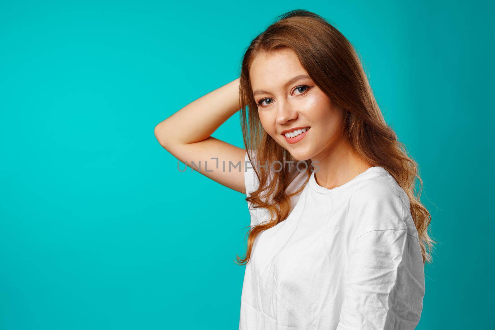 Portrait of a young beautiful happy woman smiling close up