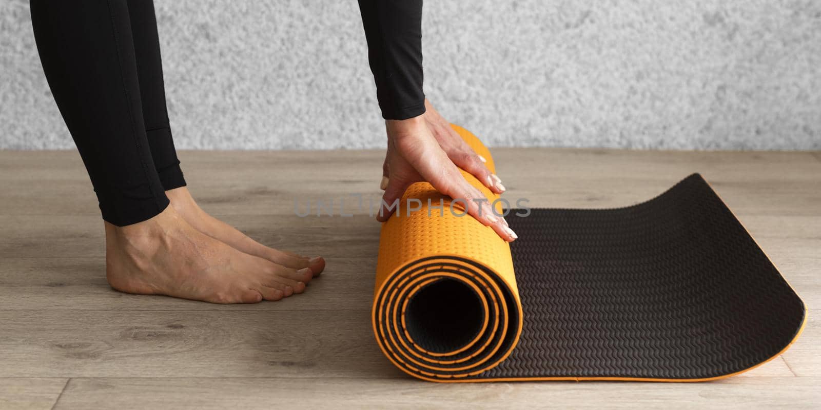 close up hands holding mat