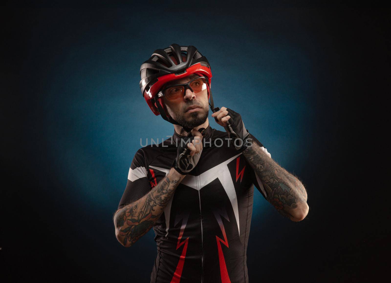 guy is a cyclist in a Bicycle helmet