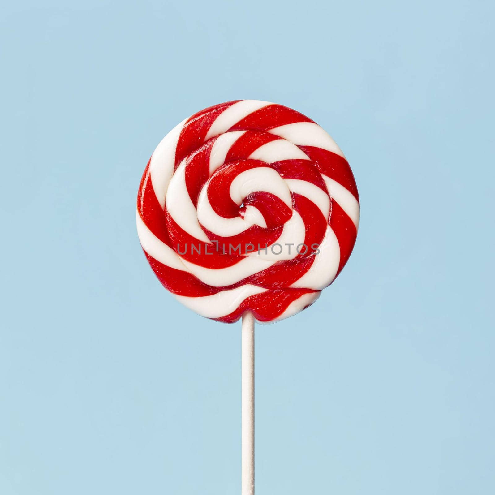 close up view colorful delicious lollipop by Zahard