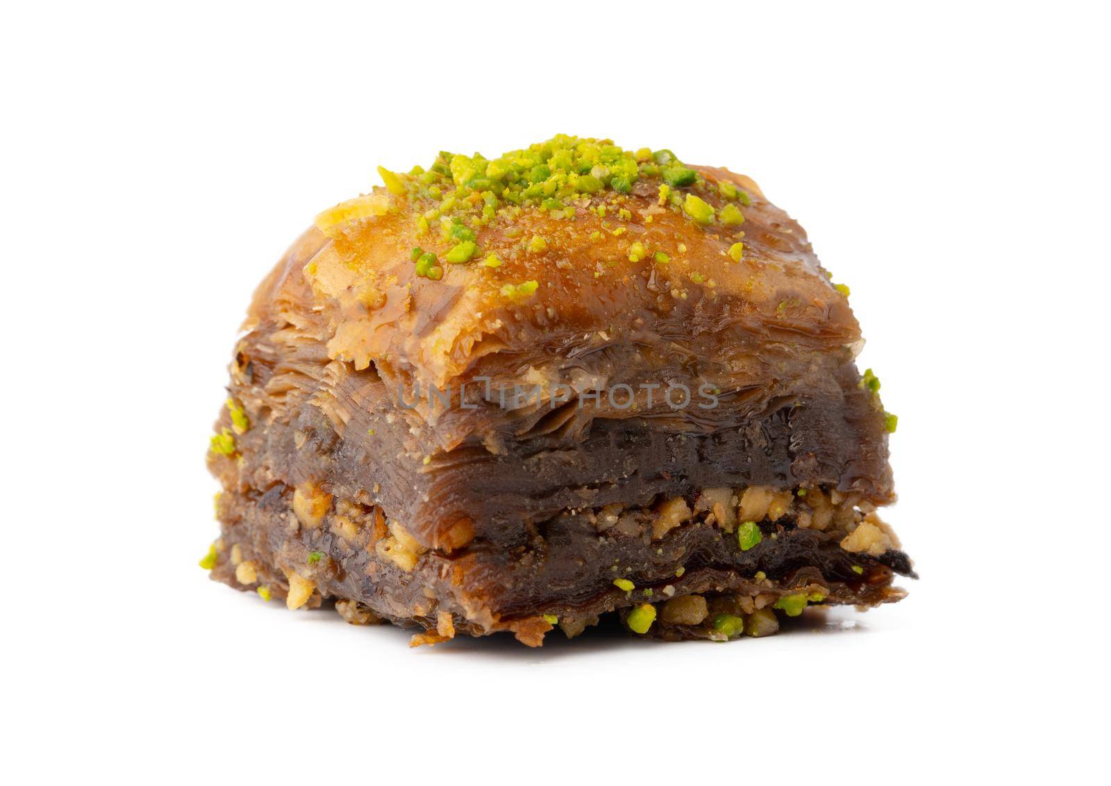 Turkish sweet pastry baklava isolated on white background, close up