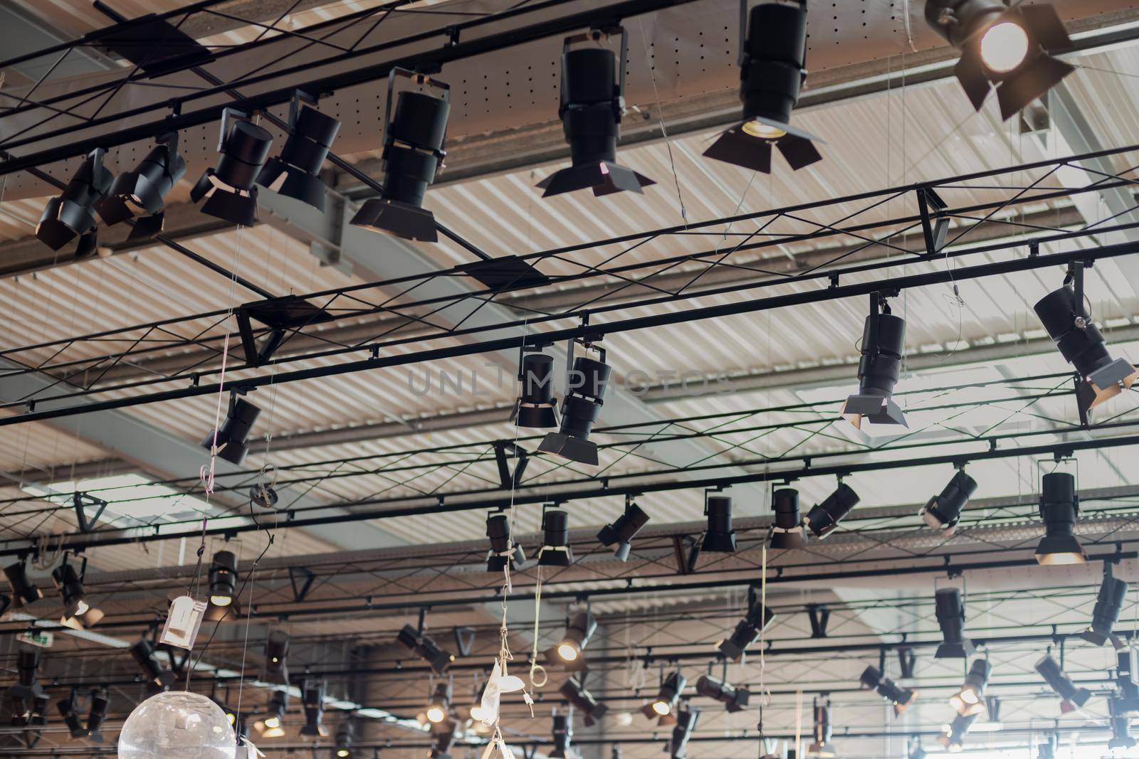 Tungsten pendant lamps on the ceiling in a shop