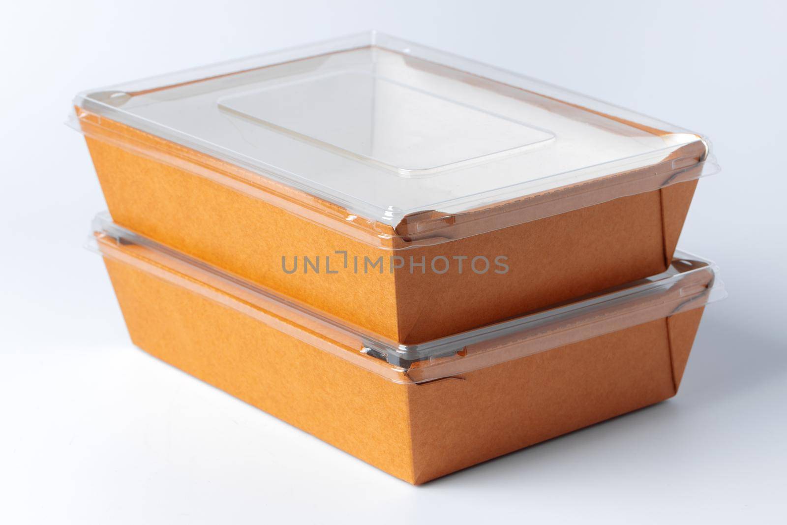 Cardboard brown food box pack isolated on white background close up