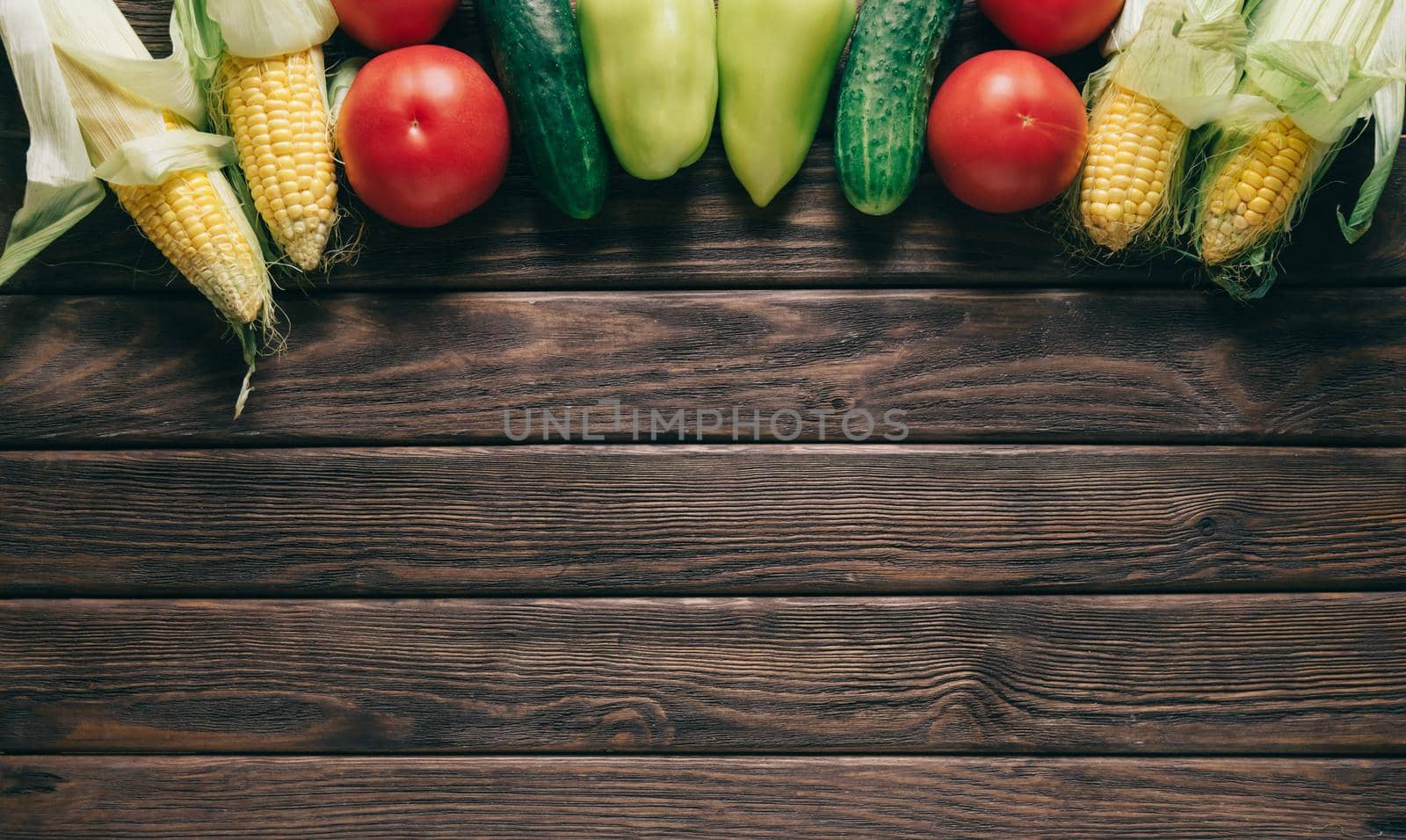 Fresh vegetables on wooden table. by alexAleksei