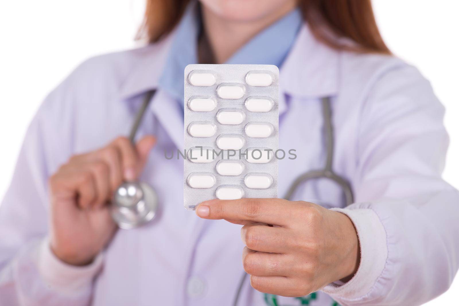 close up pills with female doctor by geargodz