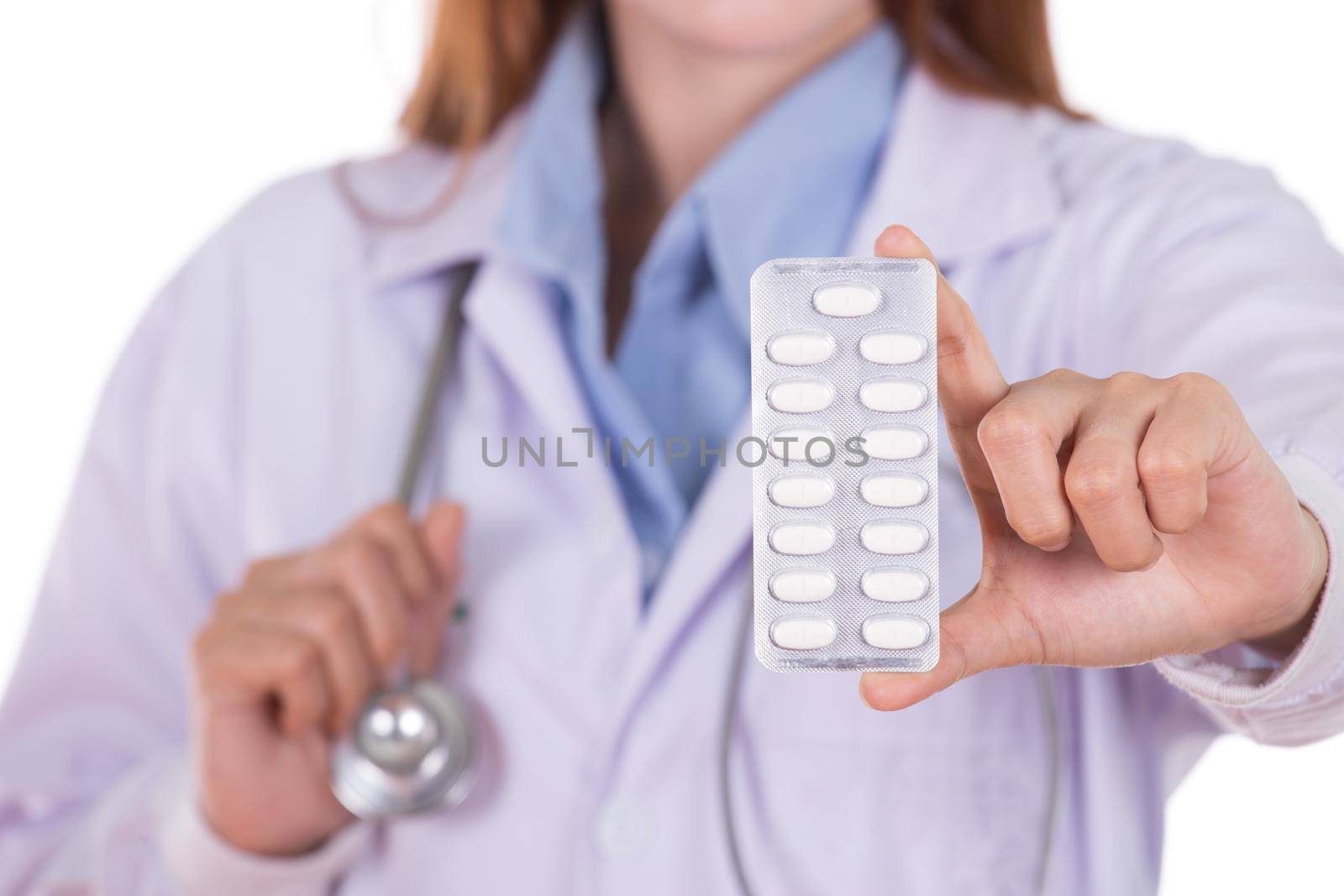 close up pills with female doctor by geargodz