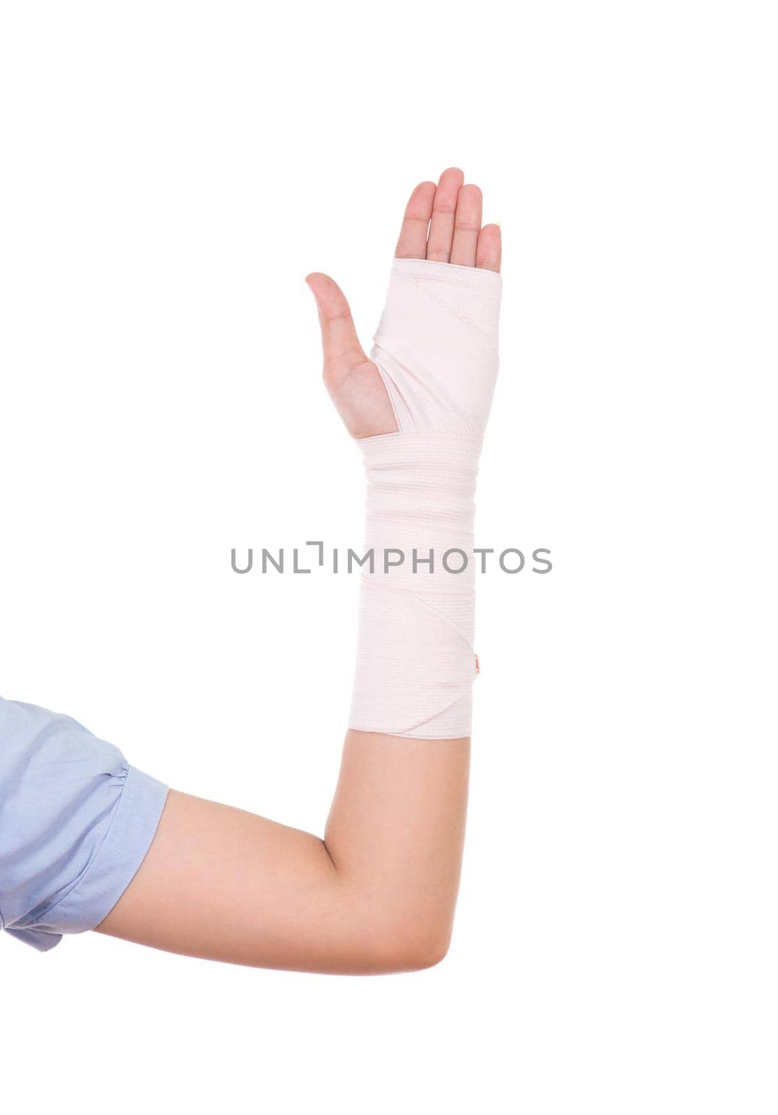 close-up injured arm wrapped in an Elastic Bandage isolated on white background