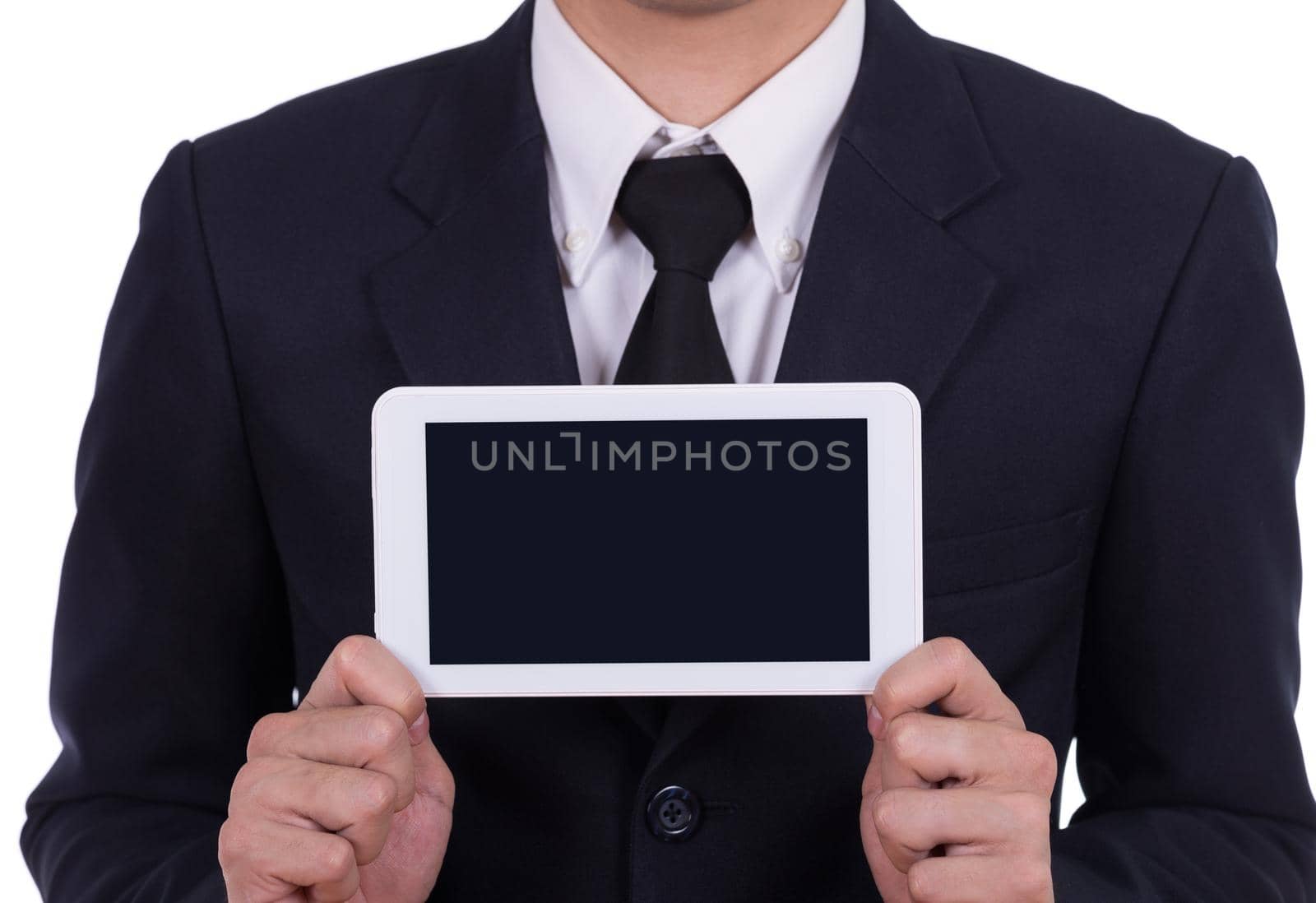 Businessman holding a small tablet touch computer isolated on white background