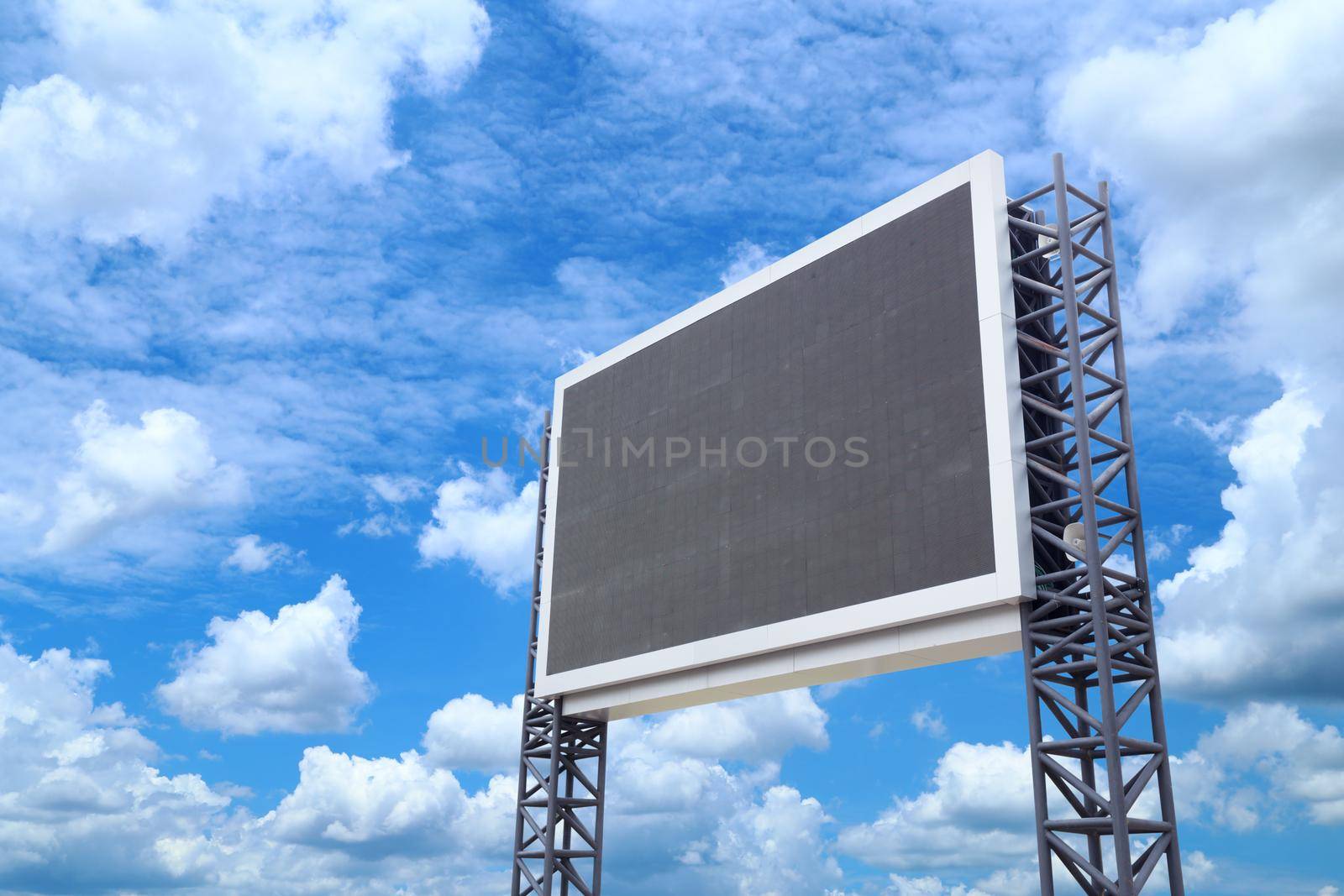 large sign board with blue sky background