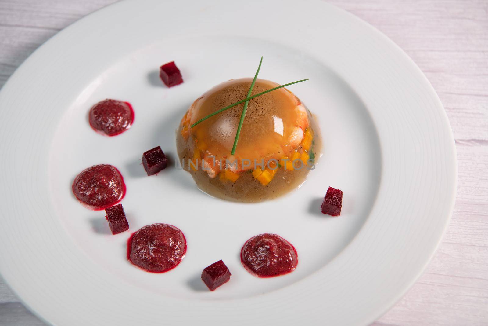 Aspic recipe, jelly made from a broth of prawns and peppery beetroot. High quality photo