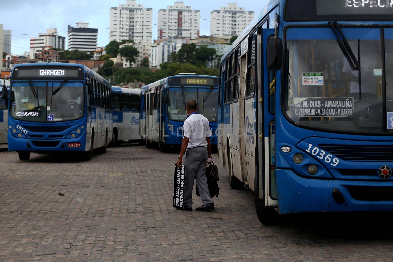 salvador, bahia, brazil - april 4, 2019: Bus driver are seen in during gravel movement in a company garage in the city of Salvador.