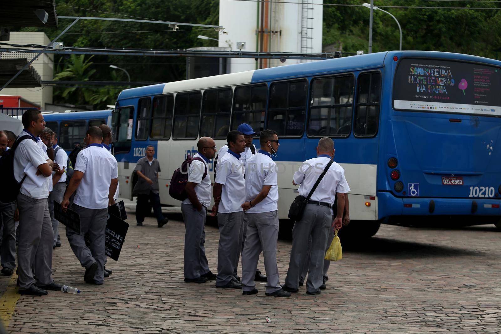 salvador, bahia, brazil - april 4, 2019: Bus driver are seen in during gravel movement in a company garage in the city of Salvador.