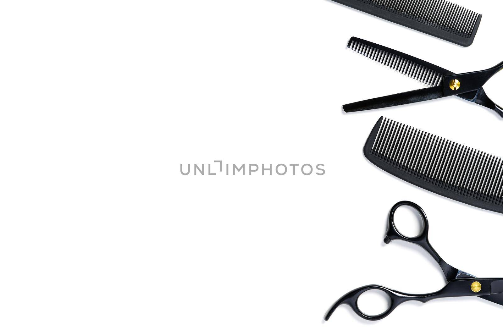 layout on white from scissors and combs for hairdressing services, isolated copy space