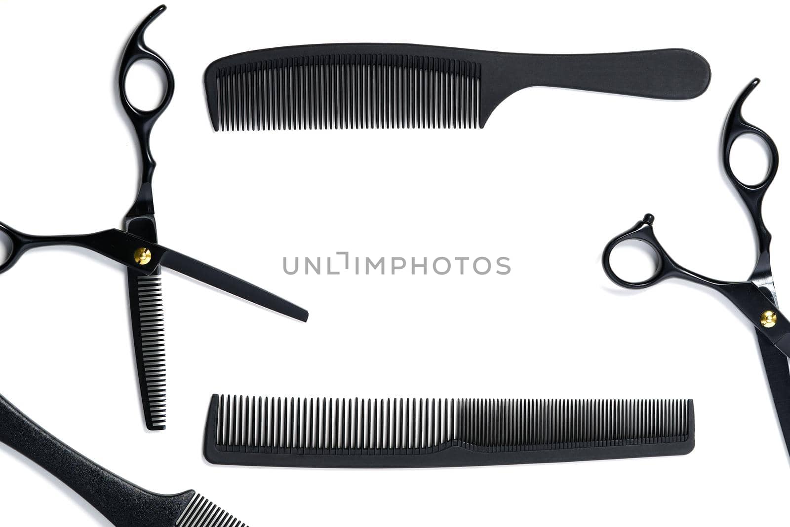 layout on white from scissors and combs for hairdressing services, isolated copy space