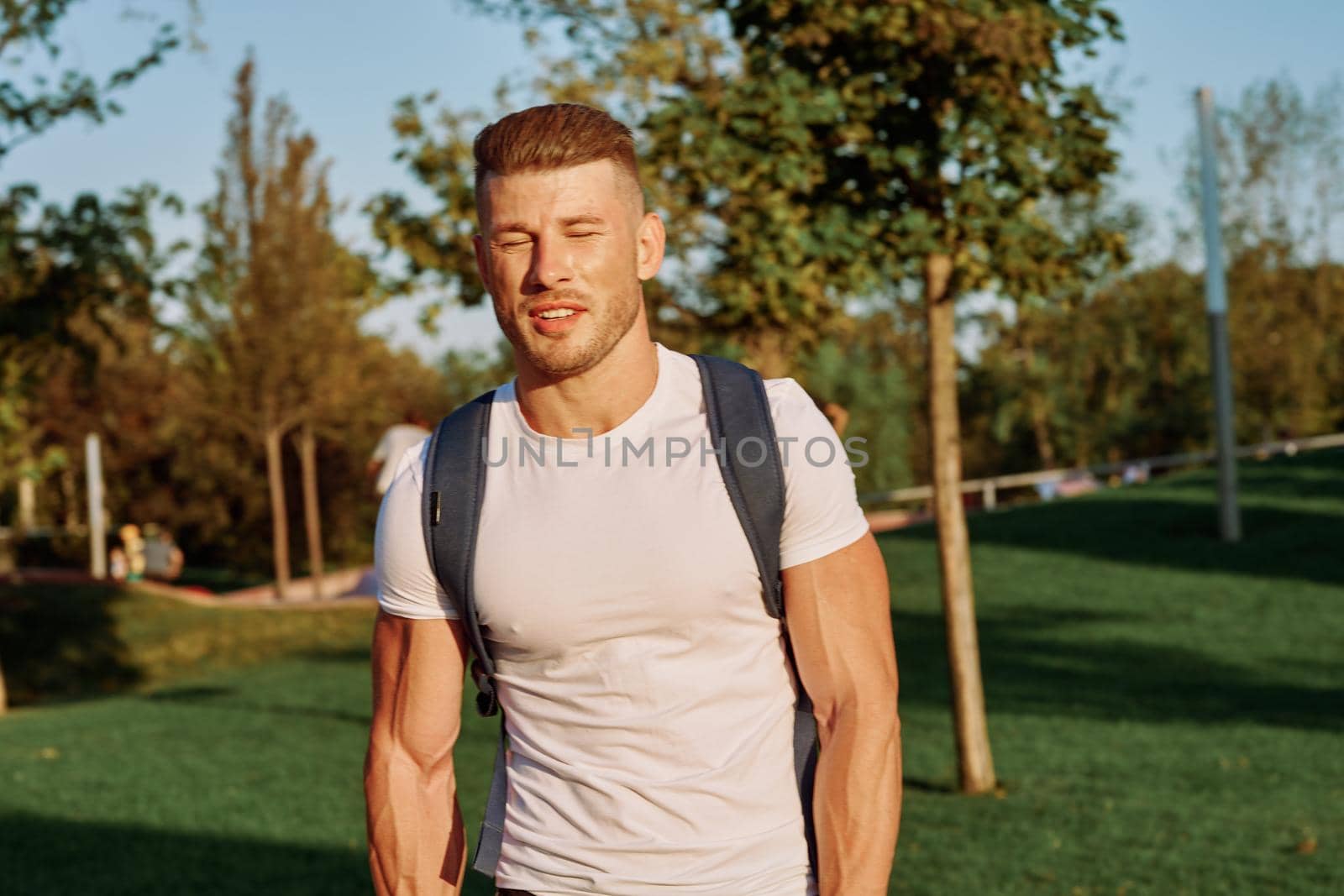 sportive man workout in the park morning motivation by Vichizh