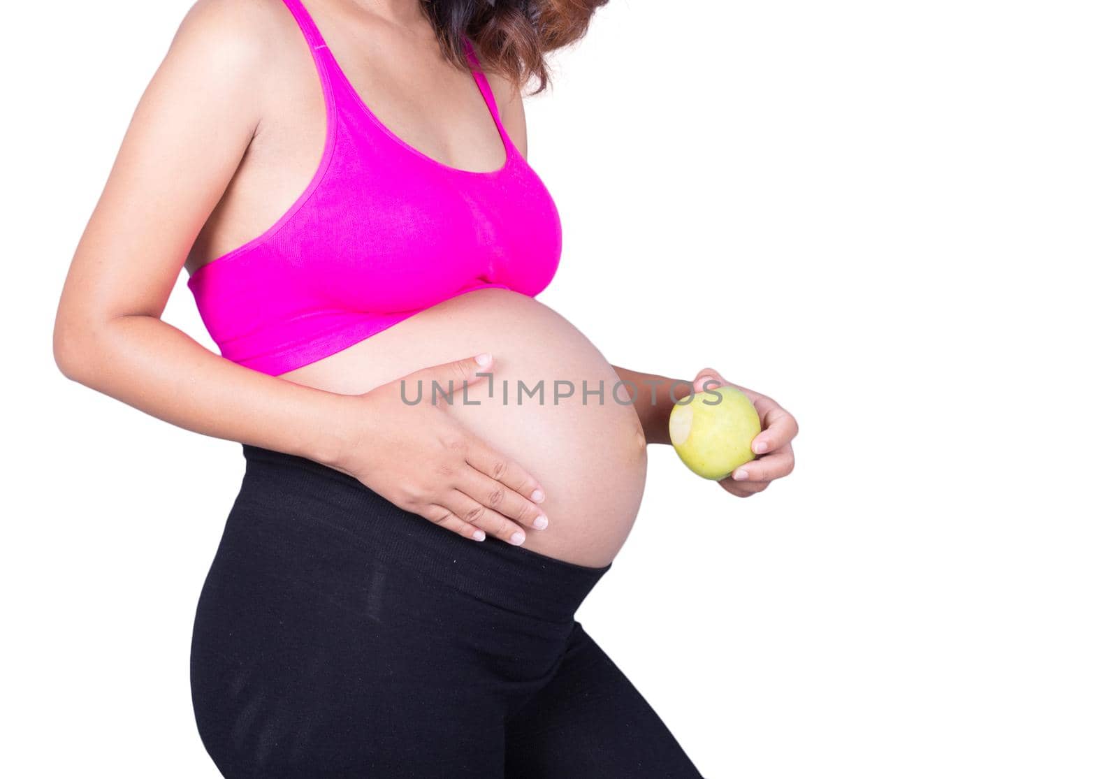 Beautiful pregnant woman with green apple isolated on white  by geargodz