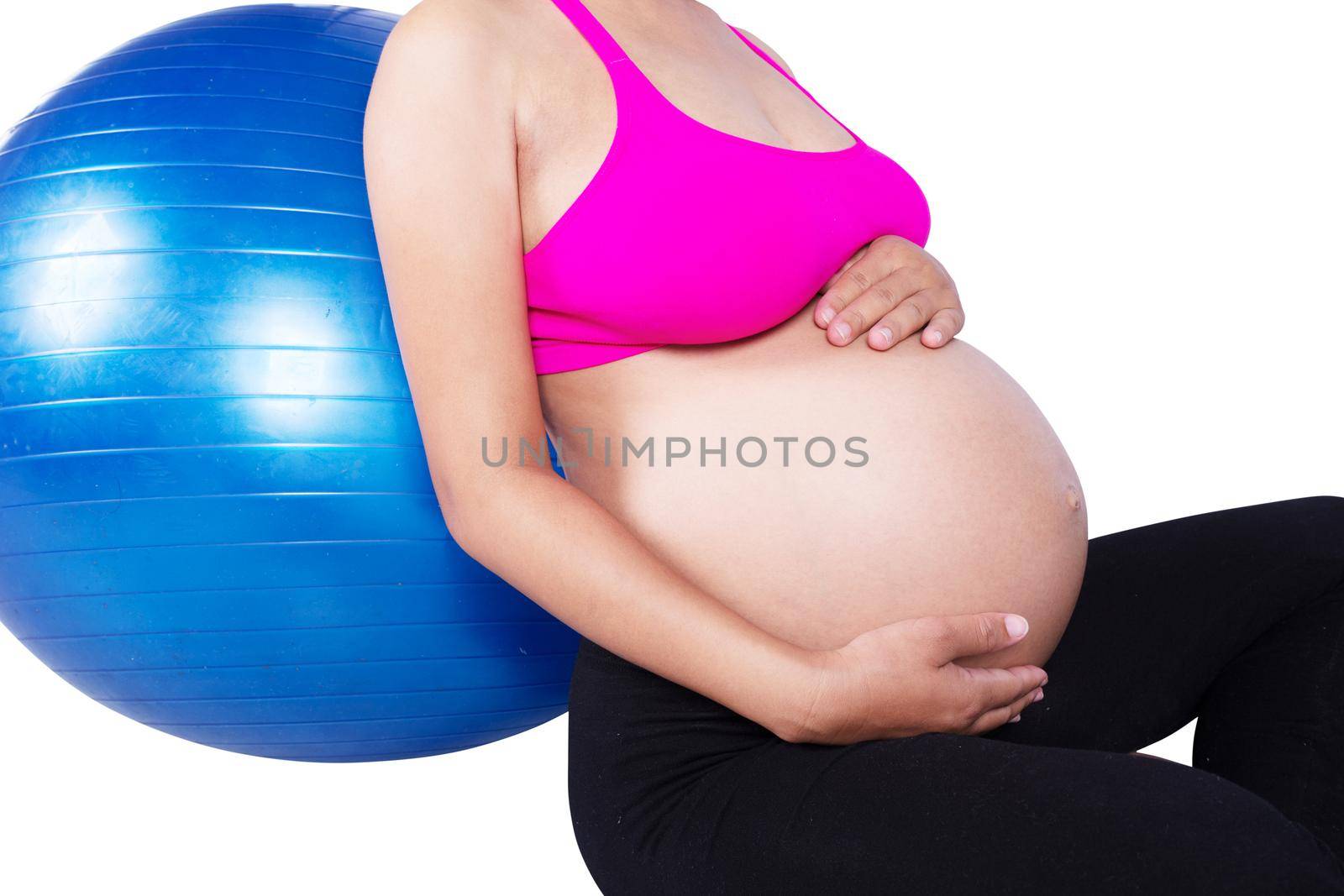 close-up belly of Pregnant woman with fitness ball isolated on white background