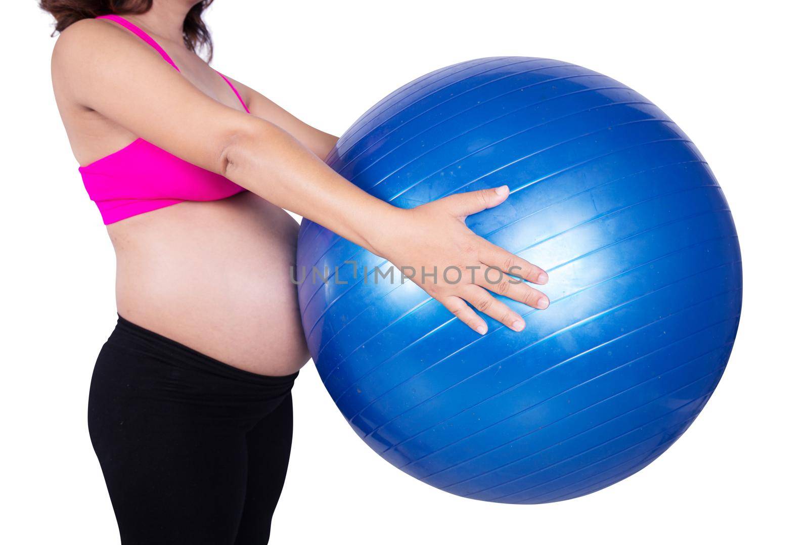 close-up belly of Pregnant woman with fitness ball isolated on white background