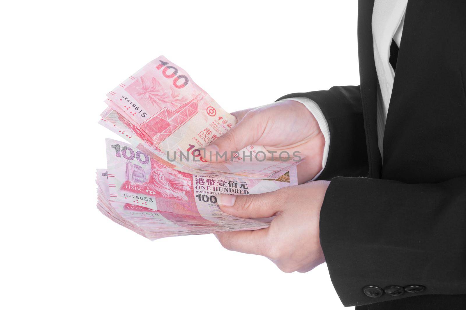 woman in suit with Hong Kong Dollar money isolated on white background