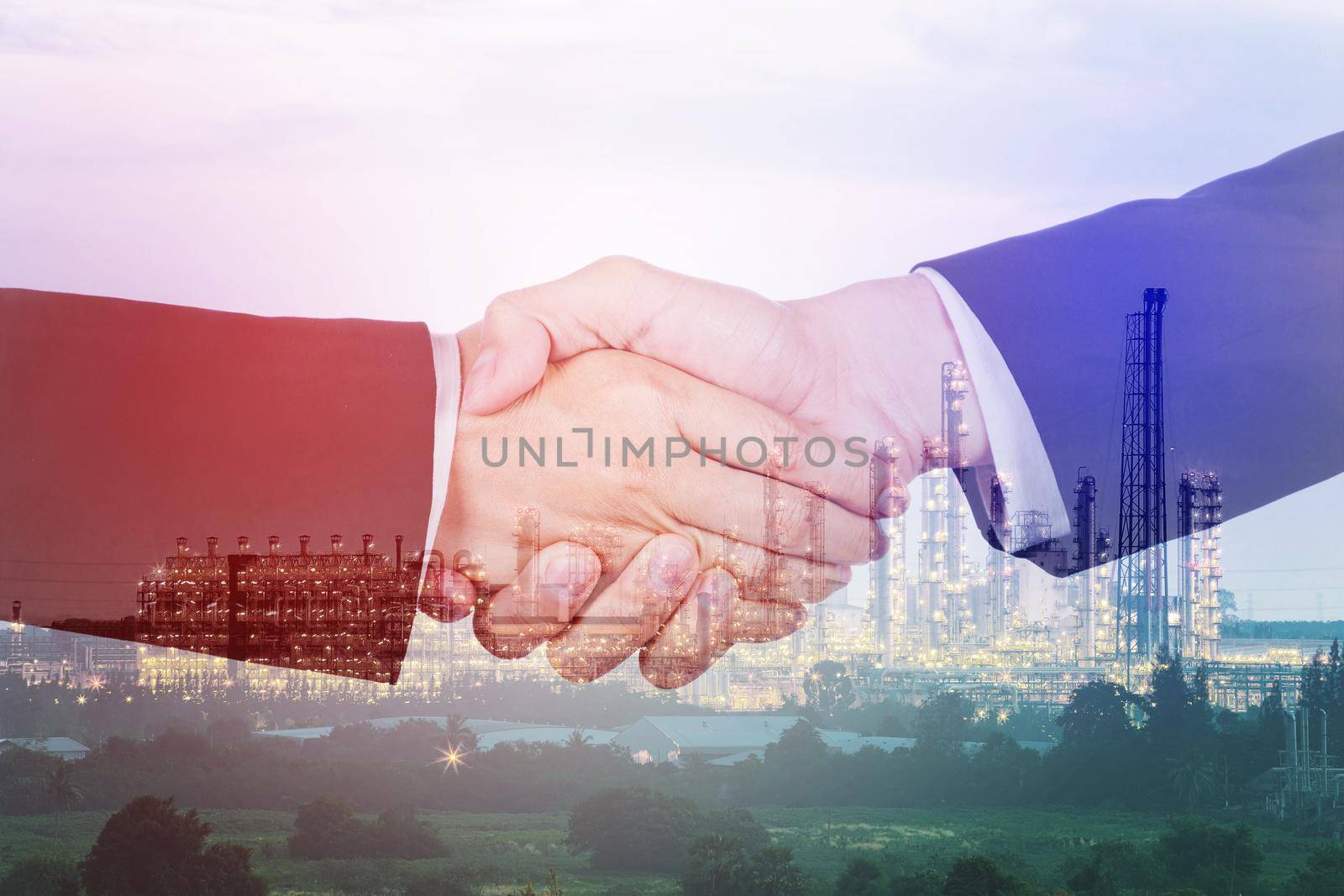 double exposure of shaking hand between businessman and businesswoman with oil refinery plant background by geargodz