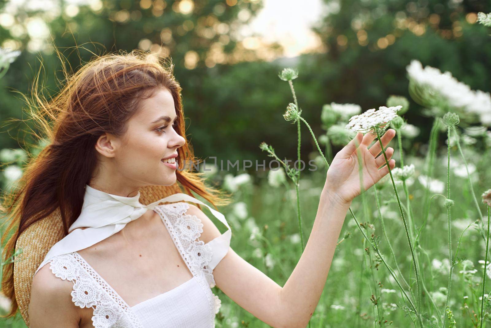 cheerful women in white dress and posing nature luxury. High quality photo