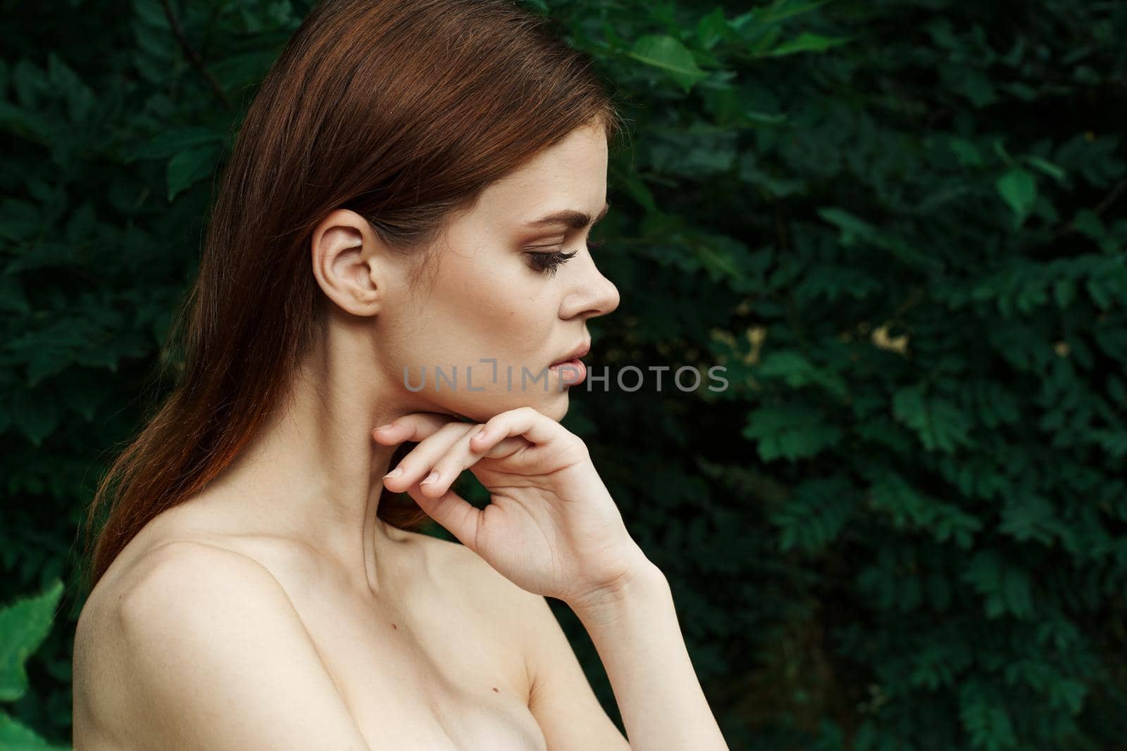 smiling woman in a field outdoors bare shoulders clear skin Lifestyle. High quality photo