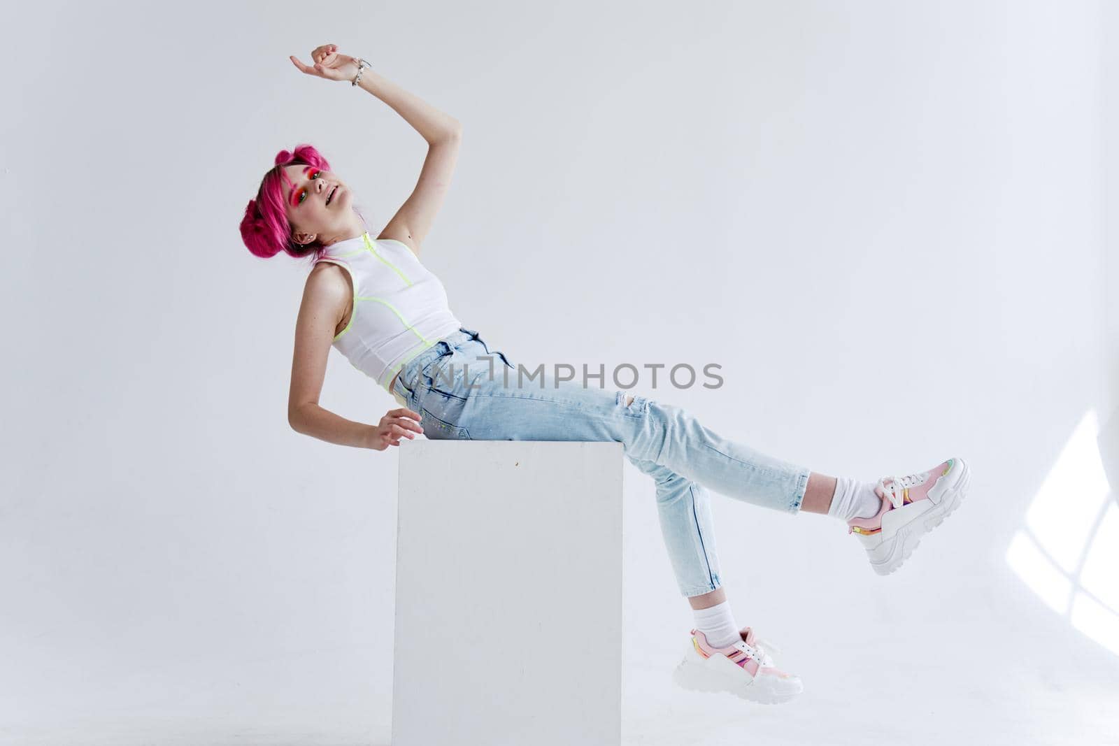 pretty woman pink hair fashion clothes posing fun. High quality photo