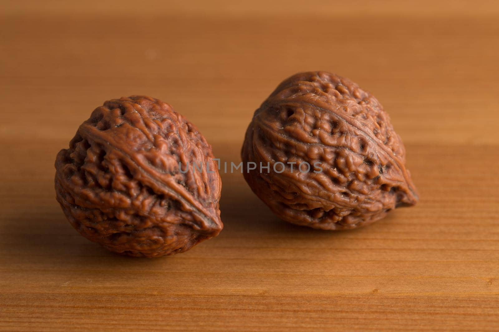 closeup shot Walnuts on wooden table