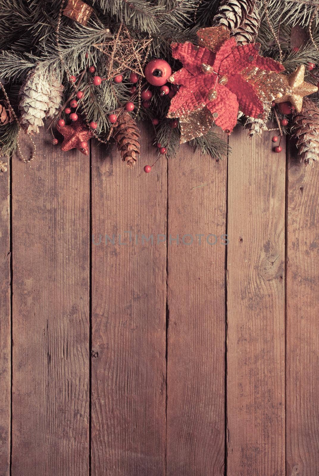 Christmas border design on the wooden background